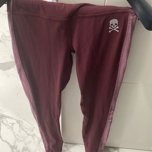 Lulu lemon soul cycle burgundy leggings with velvet stripe on side